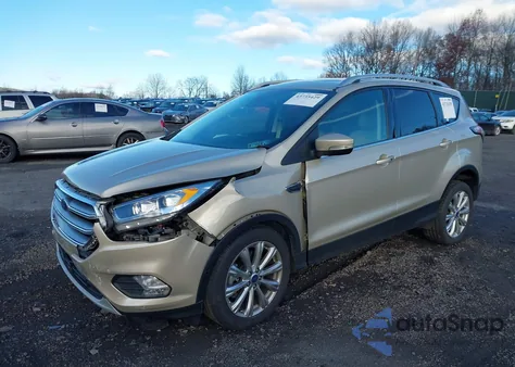 2017 Ford Escape Titanium from USA, damaged, VIN 1FMCU9J9XHUD33888